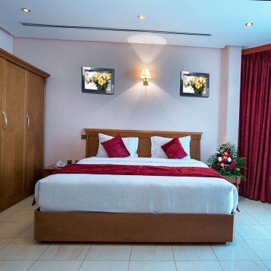 Luxurious Suite Room at Al Madina Suites Doha with Modern Amenities